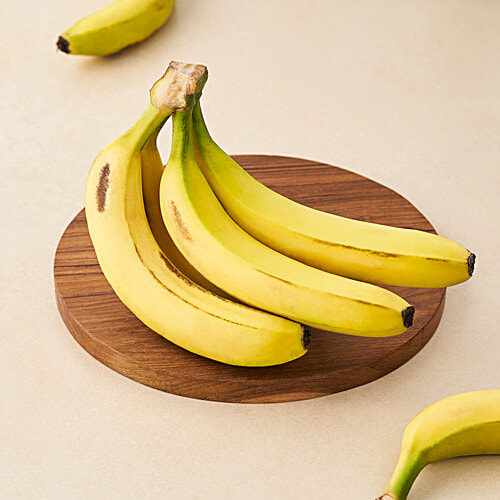 Bananas on wooden board